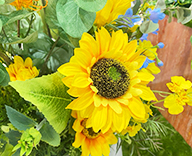 25 銀座 階段踊り場 夏装飾 造花 ヒマワリ SEASONS 事例